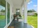 Inviting porch features comfortable seating, providing a relaxing outdoor space at 5328 Baldock Ave, Spring Hill, FL 34608