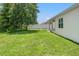 Green yard with privacy fence, perfect for enjoying the outdoors in a peaceful setting at 5328 Baldock Ave, Spring Hill, FL 34608