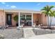 Inviting front porch with seating area and decorative lion statues at 5330 Dove Dr, New Port Richey, FL 34652