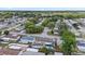 An aerial view of the home showing its prime location within a lush, tree-filled residential neighborhood at 5330 Dove Dr, New Port Richey, FL 34652
