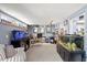 Spacious basement recreation room with large aquariums and a cozy seating area at 5330 Dove Dr, New Port Richey, FL 34652
