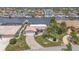 Aerial view of the waterfront community, highlighting proximity to the water and well-maintained landscaping at 5340 Pilots Pl, New Port Richey, FL 34652