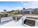 Private dock and boat lift providing convenient access to the water with a screened-in pool in view at 5340 Pilots Pl, New Port Richey, FL 34652