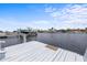 Wide water view featuring a private dock, boat lift, and easy access to boating and waterfront activities at 5340 Pilots Pl, New Port Richey, FL 34652