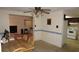 Inviting dining room with a simple table set, seamlessly connecting to a cozy living room at 5636 Dolores Dr, Holiday, FL 34690