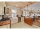 Bright open kitchen with wood countertops and island, opening to dining and living area at 6207 Main St, New Port Richey, FL 34653