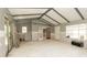 Large living room area showing the floors, walls, and light fixtures, with an incomplete remodel at 6234 Cyril Dr, Dade City, FL 33523