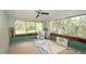Bright room with large windows, interior renovation materials, and modern features, offering potential at 6234 Cyril Dr, Dade City, FL 33523