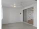 Bright dining area featuring tile flooring and glass sliding doors at 7735 Farmlawn Dr, Port Richey, FL 34668