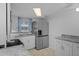 Updated kitchen with stainless steel appliances and granite countertops at 7735 Farmlawn Dr, Port Richey, FL 34668