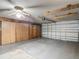Spacious garage with large closets and a standard sectional garage door at 7736 Gaston Dr, Port Richey, FL 34668