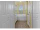 Bathroom with soaking tub, a bay window, vanity and storage at 8382 Christopher Ln, Weeki Wachee, FL 34613