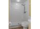 A simple shower in a bathroom with white tiled walls and floor at 8382 Christopher Ln, Weeki Wachee, FL 34613