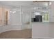Open-concept kitchen with breakfast bar that flows into the dining and living areas at 8382 Christopher Ln, Weeki Wachee, FL 34613