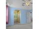 Main bedroom leads to en suite bathroom with soaking tub and dual closets at 8382 Christopher Ln, Weeki Wachee, FL 34613