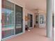 Enclosed patio with a view of the screened-in pool and backyard at 8382 Christopher Ln, Weeki Wachee, FL 34613