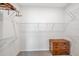 Spacious walk-in closet with wire shelving and additional dresser at 8431 Ocean Tides Cv, Parrish, FL 34219