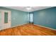 Bedroom with light and airy ambiance, ceiling fan, and natural light streaming in at 9212 Estrada Pl, New Port Richey, FL 34655