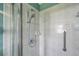 Shower with safety grab bar and handheld shower fixture at 9212 Estrada Pl, New Port Richey, FL 34655