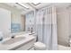 Bathroom featuring a shower/tub combo and a large vanity at 9334 Whitstone Ct, New Port Richey, FL 34655