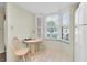 Cozy breakfast nook with bright bay window and a small table at 9334 Whitstone Ct, New Port Richey, FL 34655