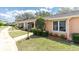 Charming home exterior with manicured landscaping, a well-maintained lawn, and inviting curb appeal at 9334 Whitstone Ct, New Port Richey, FL 34655
