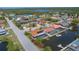 Aerial view of the neighborhood and waterfront homes at 9810 San Sebastian Way, Port Richey, FL 34668