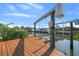 View of the boat lift over the canal at 9810 San Sebastian Way, Port Richey, FL 34668