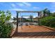 Boat lift station located on the canal behind the house at 9810 San Sebastian Way, Port Richey, FL 34668