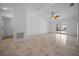 Bright living room with tile floors and sliding glass doors at 9810 San Sebastian Way, Port Richey, FL 34668
