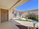 Inviting front entrance with a decorative courtyard and charming details at 10111 Glen Moor Ln, Port Richey, FL 34668