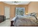Cozy bedroom with bright light and outdoor access. Ready to move in! at 10155 Duffy Cir, Weeki Wachee, FL 34613