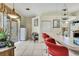 Bright kitchen featuring an island with bar seating and a view of the lanai at 10155 Duffy Cir, Weeki Wachee, FL 34613