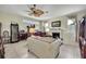 Spacious living room with fireplace, comfortable seating, and tile floors at 10155 Duffy Cir, Weeki Wachee, FL 34613