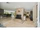 Spacious living room featuring tiled floors, fireplace, and open floorplan at 10301 Nina Ct, New Port Richey, FL 34654