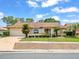 Charming single-story home featuring a well-manicured lawn and an attached two-car garage at 10442 Ventura Dr, Spring Hill, FL 34608