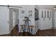 Cozy dining area with a table, stools, and cabinetry that offers a spot to share a meal at 1049 Larkin Rd, Spring Hill, FL 34608