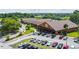 Exterior of a YMCA with parking, landscaping, and pedestrian walkways at 1049 Larkin Rd, Spring Hill, FL 34608
