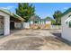Exterior view of backyard building with green shutters at 1115 Pennsylvania Ave, Palm Harbor, FL 34683