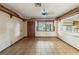 Living room featuring ceramic tile flooring and wood trim at 1115 Pennsylvania Ave, Palm Harbor, FL 34683
