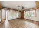 Living room featuring ceramic tile flooring and wood trim at 1115 Pennsylvania Ave, Palm Harbor, FL 34683
