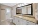Bathroom featuring granite vanity and tile flooring at 11291 Countrywood Ct, Spring Hill, FL 34609
