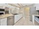 Modern kitchen with granite countertops, stainless steel appliances and an open design at 11291 Countrywood Ct, Spring Hill, FL 34609