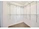 Organized walk-in closet with metal shelving at 11291 Countrywood Ct, Spring Hill, FL 34609