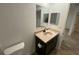 Bathroom featuring a modern vanity and mirror at 11392 Beechdale Ave, Spring Hill, FL 34608