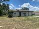 Charming single-story home with a well-maintained yard and inviting front entrance at 11392 Beechdale Ave, Spring Hill, FL 34608