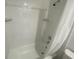 White shower featuring a bathtub and shower head at 11392 Beechdale Ave, Spring Hill, FL 34608