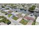 Aerial view of homes along a canal, highlighting boat docks and waterfront living at 12637 2Nd Isle, Hudson, FL 34667