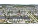 Aerial view showcases homes along canals, providing direct water access and boating opportunities at 12637 2Nd Isle, Hudson, FL 34667