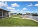 Well-maintained lawn that slopes to the waterfront at 12637 2Nd Isle, Hudson, FL 34667